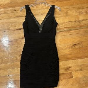 Cute jeweled black mini dress size 6